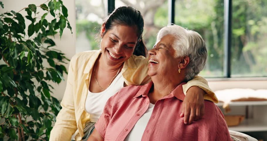 Senior mom, happy and woman in home for bonding, relationship and laughing on sofa. Family, conversation and elderly mother and daughter in living room for embrace, love and connection on weekend