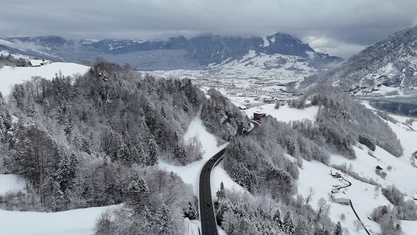 Drone video at Schwyz Sattel Winter wonderland landscape in Switzerland after heavy snowfall