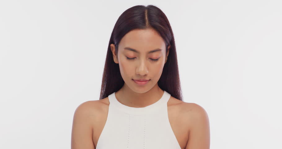 Portrait of a young Asian girl with light makeup and perfect skin. Beautiful face of young woman with natural skin.	