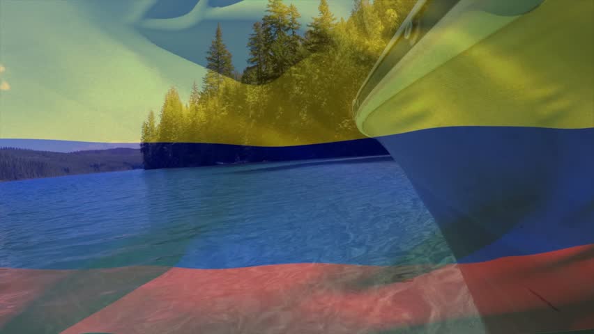 Boat bow moving forward after start, tricolor overlay sweeping and tinting water toward forest. Hull, lake, flag, wake, reflections, shoreline, hills