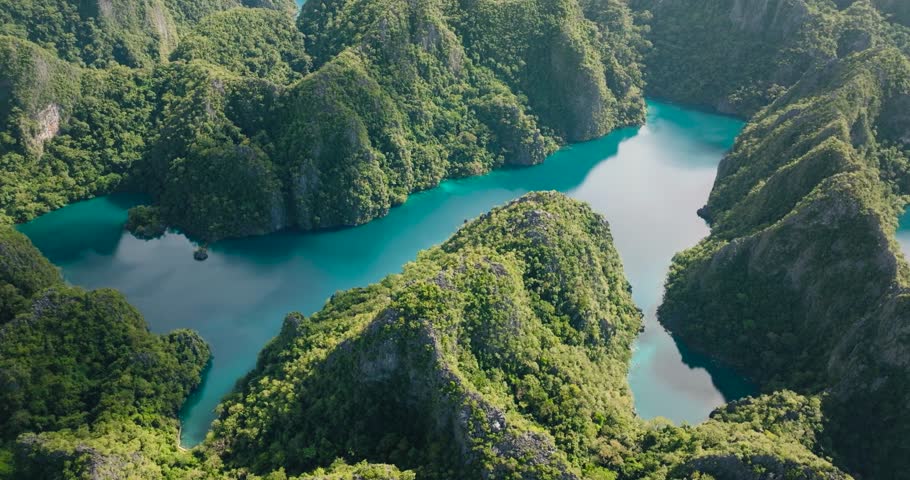 Kayangan Lake with underwater rock formations, caves and islets. Coron, Palawan. Philippines.