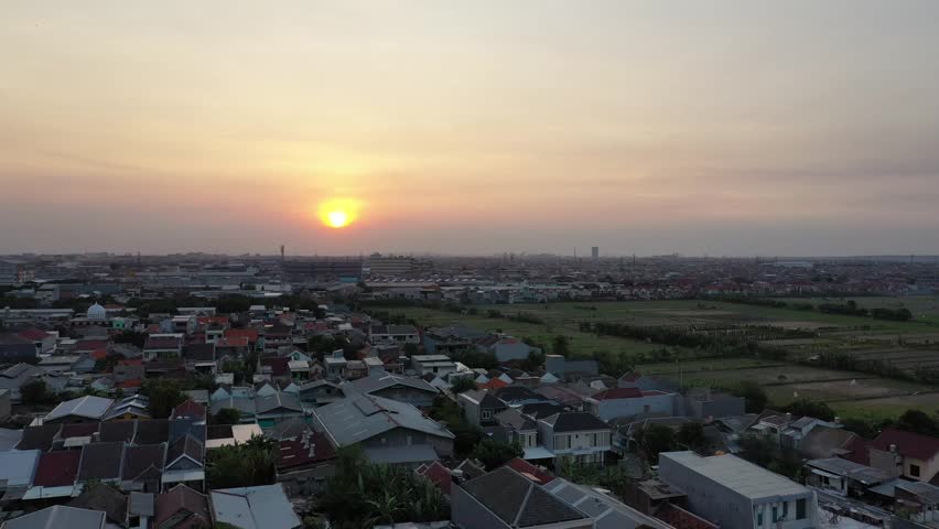 Golden hour unfolds in quiet perfection as the sun slowly melts into the horizon, painting the sky with shades of amber, rose, and soft lavender. In this panoramic view, the ocean stretches endlessly, reflecting the fading light like a shimmering mirror of liquid gold. Gentle waves roll toward the shore in a calming rhythm, carrying the warmth of the day into the promise of night. The breeze feels softer, the world moves slower, and for a brief moment, everything seems perfectly aligned with nature’s breath.

As the sun dips lower, its glow deepens, casting long reflections across the water and creating a pathway of light that feels almost magical. The clouds drift lazily, touched by fiery highlights and delicate shadows, adding depth and drama to the evening canvas. The sea responds with subtle ripples, catching every last ray before twilight begins to settle in.

This sunset panorama is more than a beautiful view—it is a reminder to pause, to breathe, and to appreciate the simple yet extraordinary beauty that surrounds us. In the meeting of sky and sea, there is a quiet conversation between light and water, a timeless dance that unfolds differently each day yet always feels familiar. As daylight fades and the first hints of dusk appear, the horizon holds onto its final glow, leaving behind a sense of peace, gratitude, and endless possibility carried on the waves.