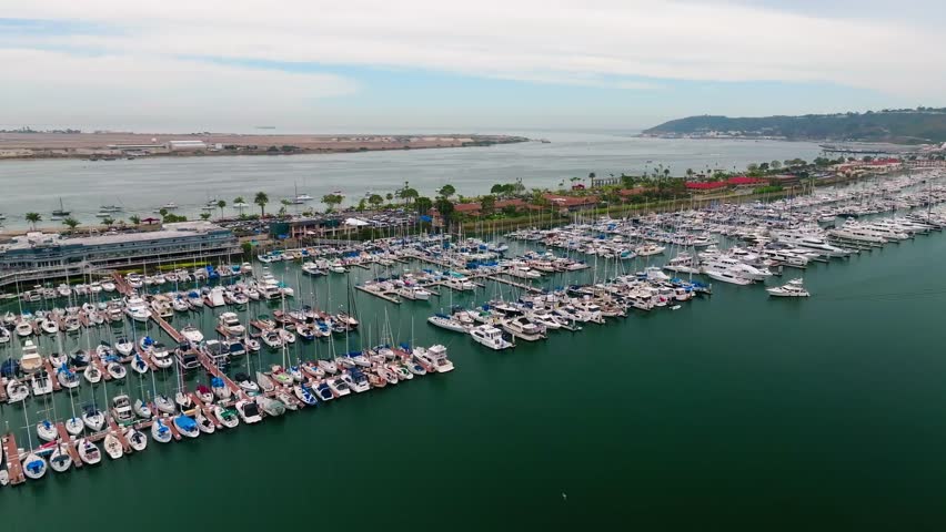 60FPS Push in and Tilt Drone Footage of Boats in the Harbor at Shelter Island, in San Diego, California, USA