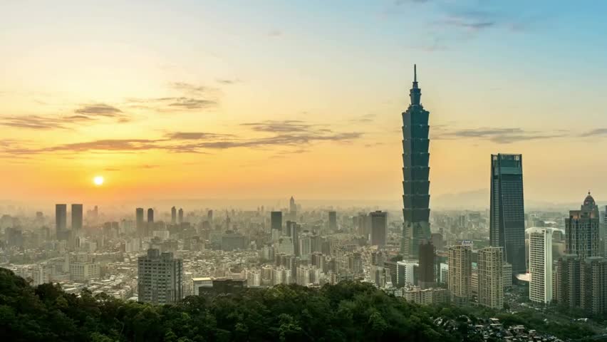 Taipei skyline at sunrise with Taipei 101 skyscraper, perfect for cityscape, travel, and skyline footage.