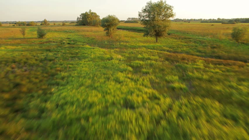 Aerial panorama panorama of the green Valley with trees and haystacks. Autumn Landscape panorama. Aerial view. 