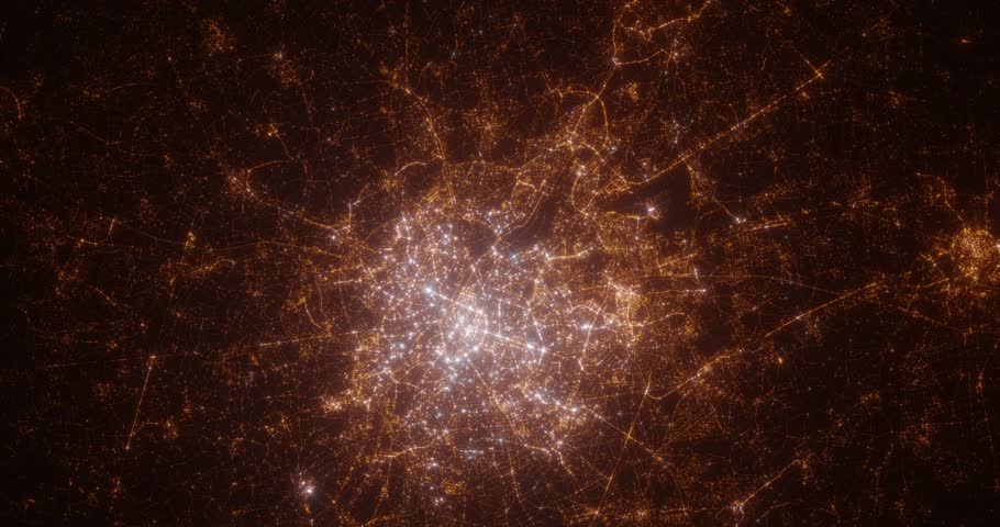 Brussels (Belgium) aerial view at night. Top view on modern city with street lights. Camera is flying above the city, moving backward