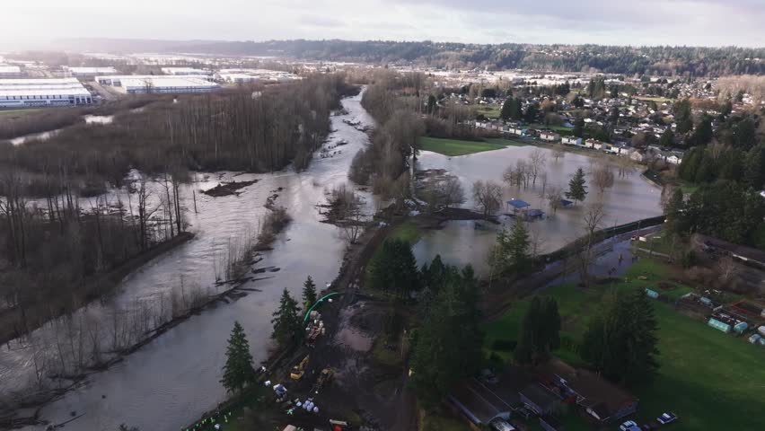 White River Overflowing After Levee Breach Breaks, Flash Flood Warning In Pacific City, Washington State, USA. Aerial Shot