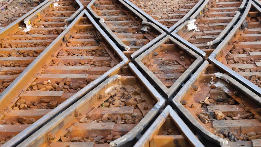 railway track junction with multiple rail lines intersecting