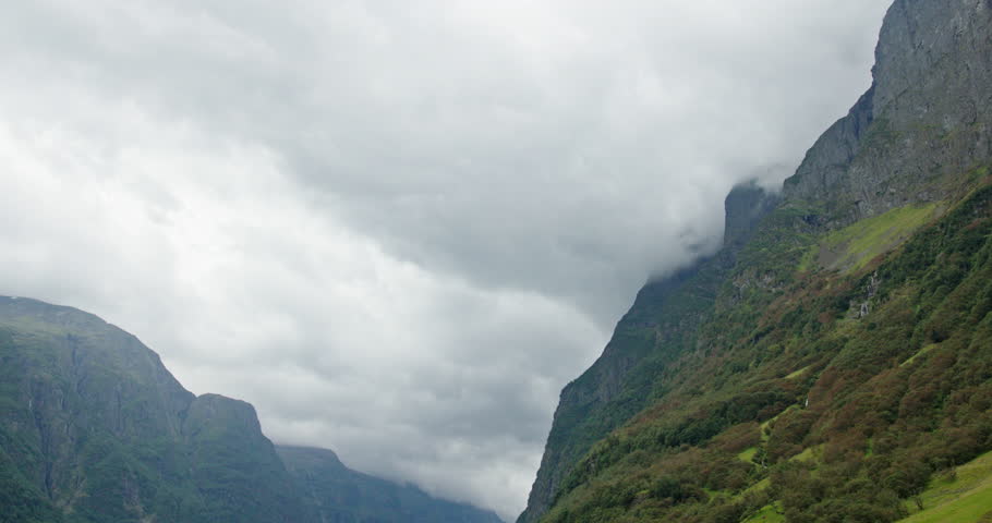 Dramatic norwegian fjord landscape with steep mountains