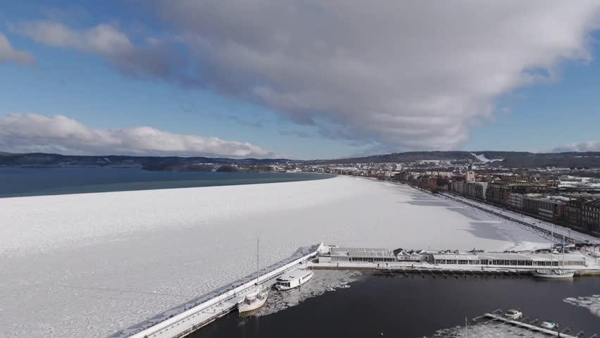 Aerial View of Frozen Harbor in Winter Landscape