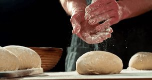 Chef Clapping Flour Covered Hands in Super Slow Motion at 1000 fps. Flour Explosion During Yeast Dough Preparation, Baking Concept on Dark Background - Powered by Shutterstock - Get 15% off with code: PIKWIZARD15