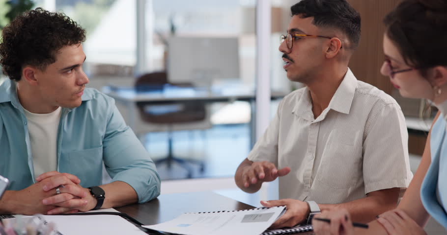 Planning, meeting and business people in office, documents for article facts and conversation. Journalist, group or employees with discussion, team and ideas for story or feedback for news report