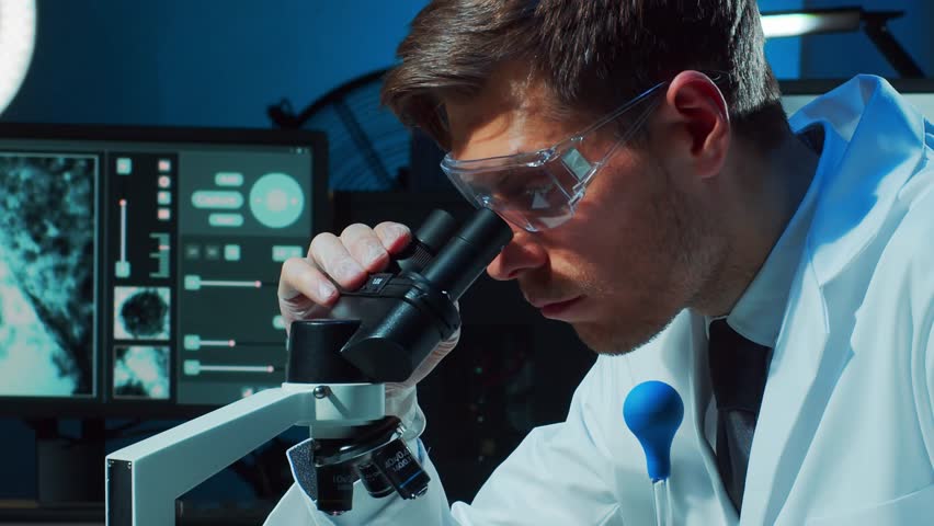 Scientific laboratory filled with various research equipment. Scientists are conducting experiments and research. Science and technology concept.