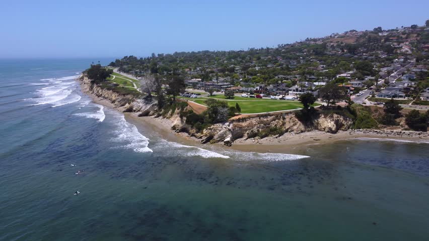 Santa Barbara, California, overlooking Shoreline Park along a sandy beach and calm Pacific Ocean on a clear summer day along the Southern California coast. East and West Mesa.