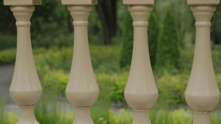 side view of a classic balustrade in a city park	

