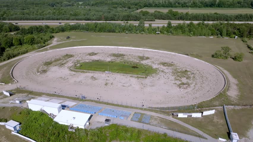Winston Speedway in Rothbury, Michigan with drone video moving in wide.