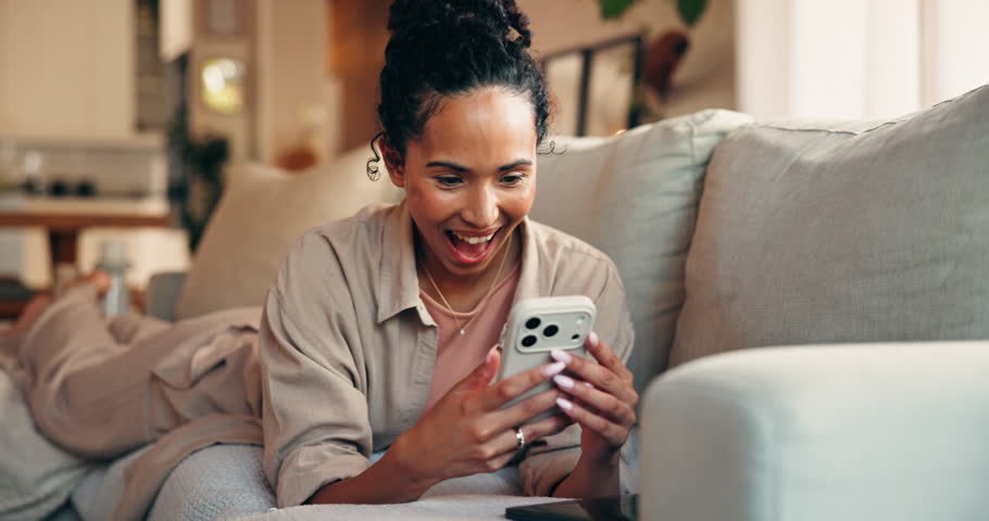 Phone, video call and woman on sofa in home with online networking, greeting or communication. Technology, happy and female person with cellphone for virtual conversation on mobile app in living room