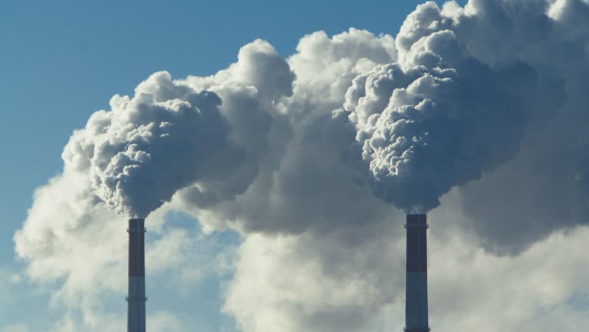 Chimneys of a thermal power plant.  Timelapse, accelerated shooting. problems with thermal energy and electricity.