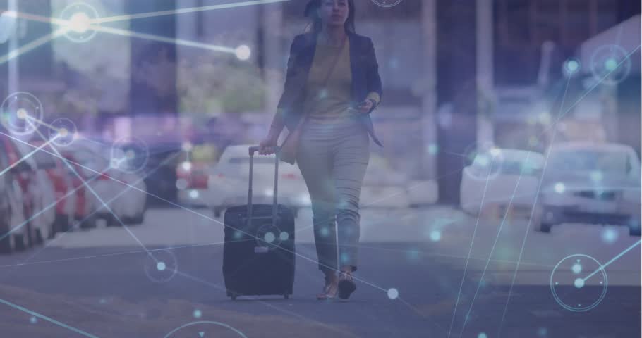 Network of connections over caucasian businesswoman with trolley bag walking on the street. Global networking and business technology concept