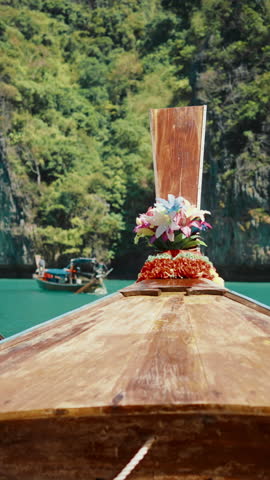 Unique nature of Thailand, view from traditional wooden longtail boat floating in Maya Bay between Phi Phi islands. Exploring planet and discovering new tourist attraction, amazing culture of Asia