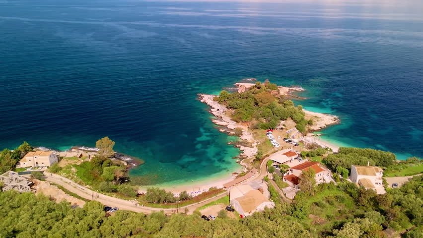 Aerial View of the Stunning Coast of Kassiopi Village, Northeast Corfu Island, Greece