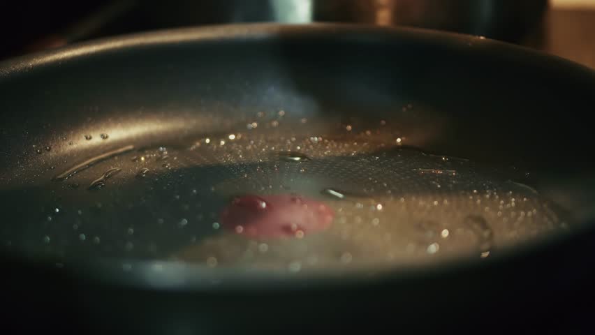 Egg Frying In Hot Pan On Domestic Stove, Cooking Healthy Breakfast In Kitchen, Culinary Process Of Preparing Fried Omelette For Morning Meal, Food Texture Detail On Nonstick Frying Surface, Domestic Catering Service, Restaurant Hospitality, Home Nutrition Experience