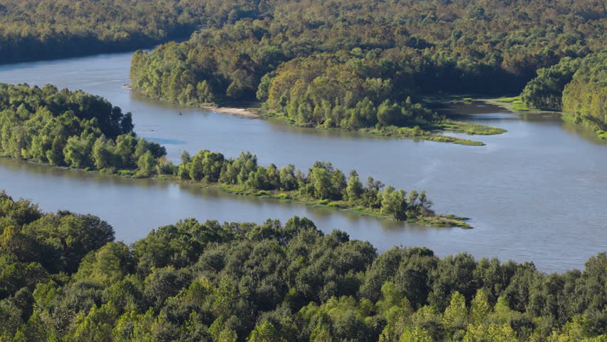 Arkansas River With Forested Banks In Summer In Arkansas, USA. - aerial shot