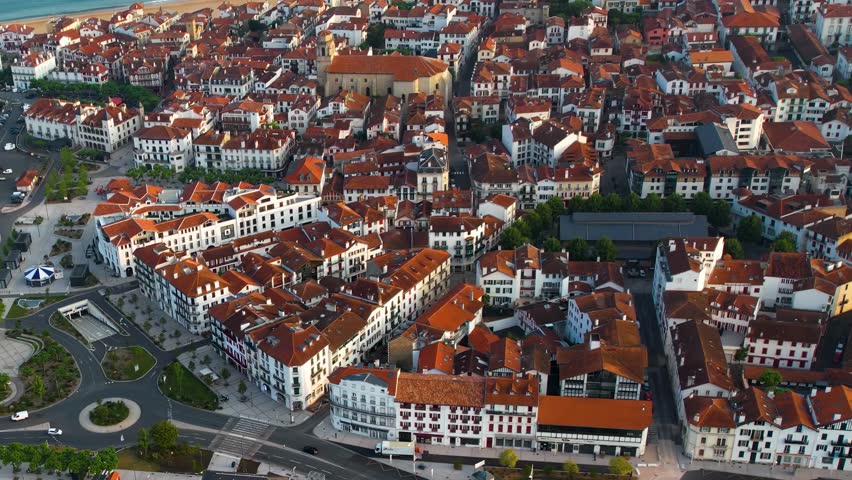 A panoramic aerial view around the old town of the city Saint-Jean-de-Luz on a sunny summer morning in France, catalonia.