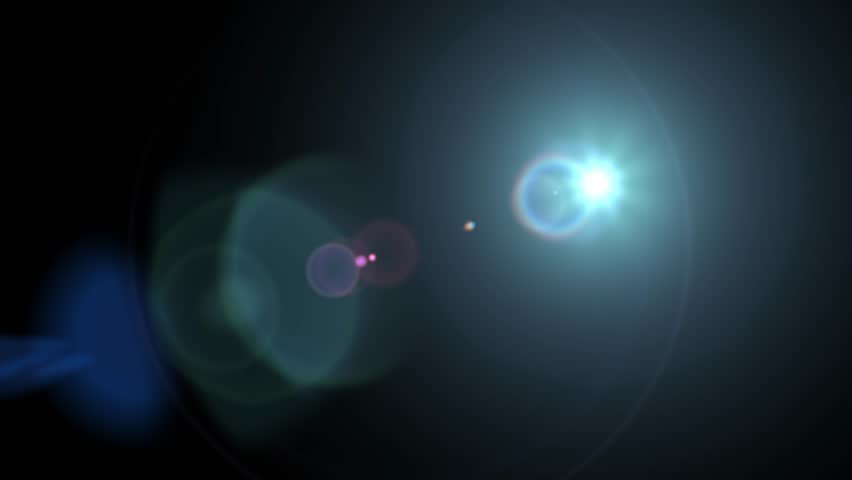 Abstract greenish and blue optical lens flare moving across the frame. Isolated on black background for easy compositing or as a transition element