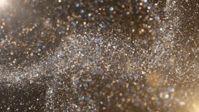 Swirling vortex of silver and gold glitter particles, creating a shimmering celestial or cinematic atmosphere. - Powered by Shutterstock - Get 15% off with code: PIKWIZARD15