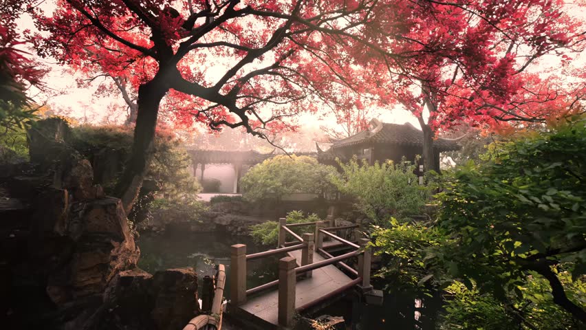 Serene Chinese garden at sunrise featuring vibrant red blossoms, wooden bridge, and traditional architecture reflected in calm water.