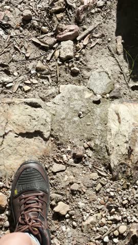 Walking on dirt trails, hiking, body movement, adventure.