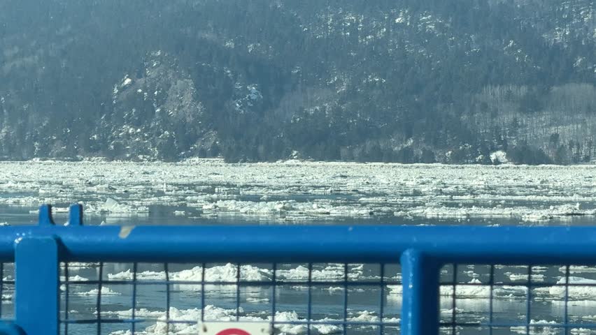 Winter landscape in Charlevoix, Quebec, Canada. The ferry from Isle aux Coudres to Charlevoix in winter.