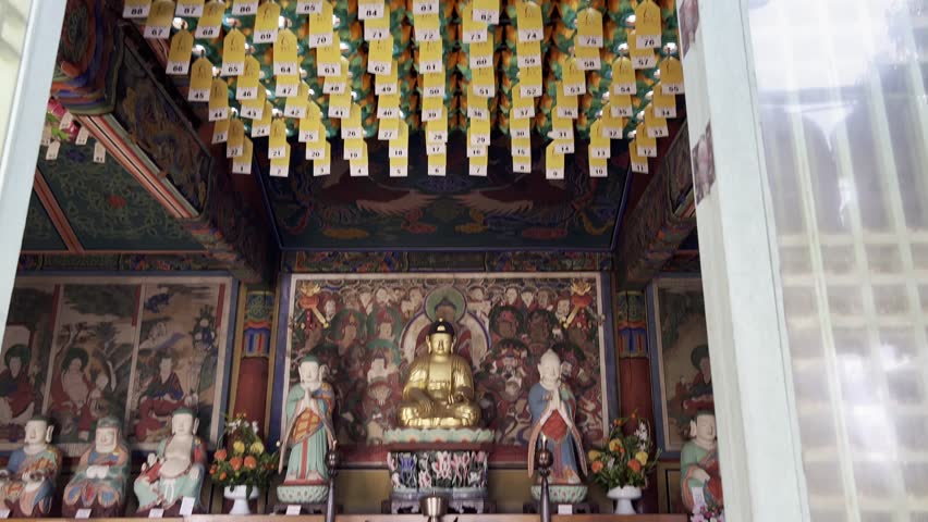 SEOUL, SOUTH KOREA - FEBRUARY 2026: A majestic view of the 23-meter tall Maitreya Buddha statue at Bongeunsa Temple in Gangnam. This ancient Buddhist temple offers a peaceful spiritual sanctuary surrounded by the modern skyscrapers and urban skyline of Seoul.