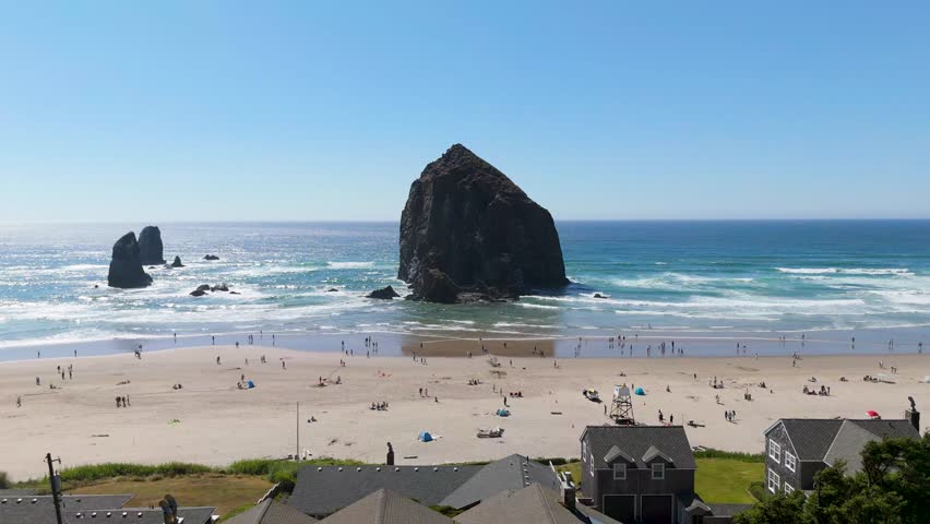 Wide shot of Haystack Rock in Cannon Beach, Oregon.