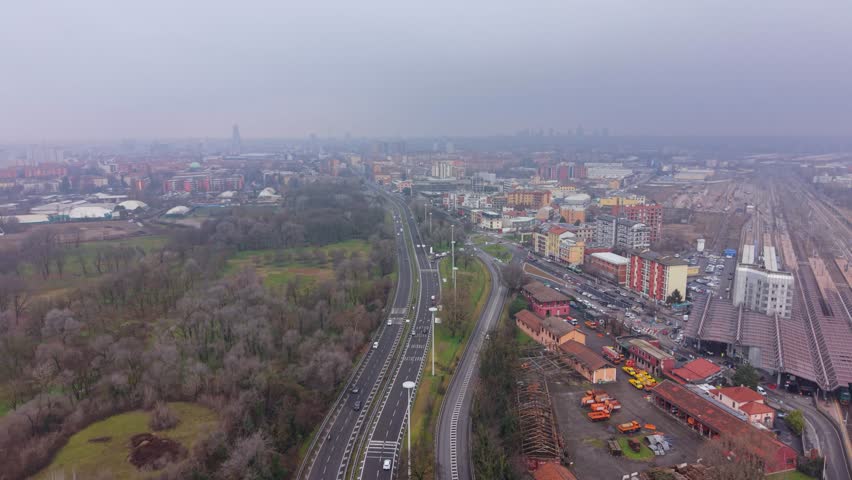 Aerial View of Cars Driving on Urban Highway in Milan, Italy