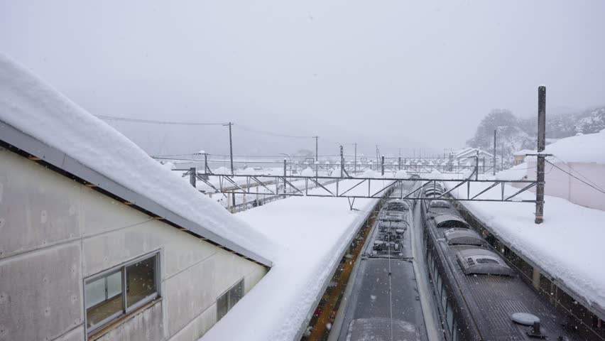 Snow on Japanese Trains at Kinosaki Onsen Station, Hyogo Prefecture
