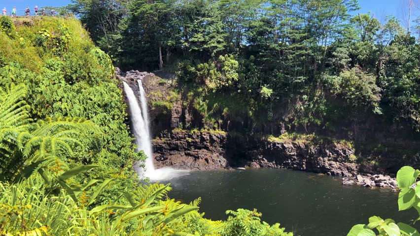 Wailuku River waterfall, lush greenery, tranquil nature, Big Island Hawaii