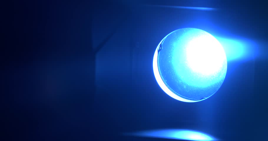 Slow motion, Intense Blue Spotlight Hitting Lens, Circular Aperture And Horizontal Beam, Neon Glow With Tech