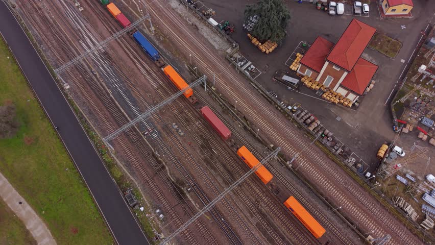 Train Traveling Along Railway Tracks Near Highway Junction Milan