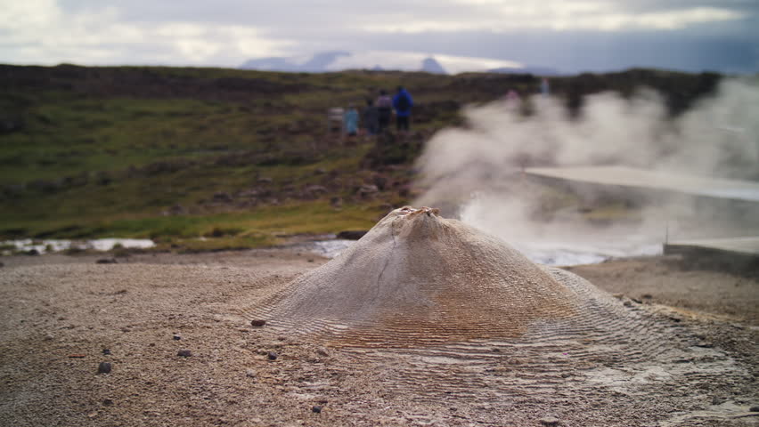 Active geyser erupting in Iceland geothermal area