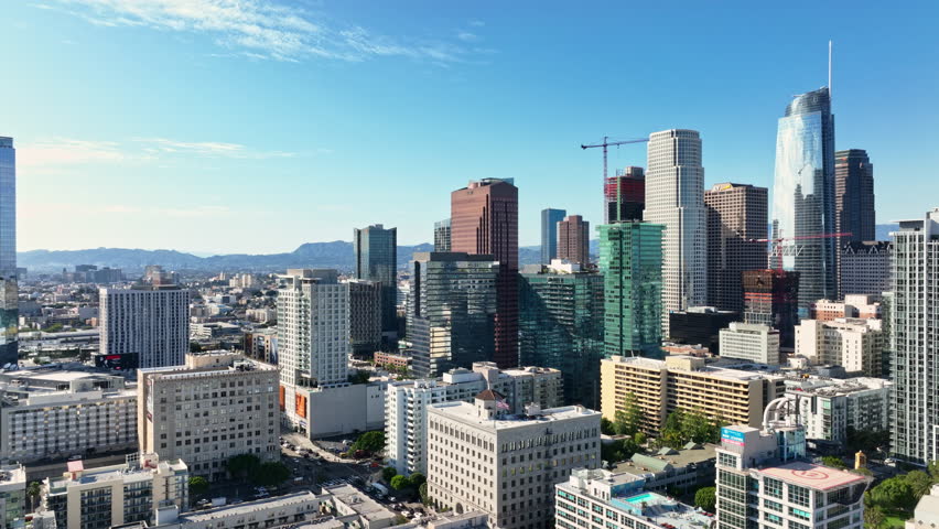 Panorama of Los Angeles. Los Angeles skyline drone footage. City of LA from drone view. Downtown Los Angeles aerial scene. LA city skyline from air. Air view over downtown Los Angeles.