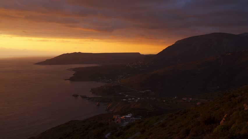 Mani Peninsula with coastal villages at sunset in Greece