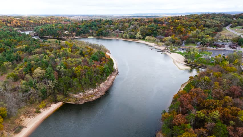 Aerial View of Winding Wisconsin River Through Vibrant Autumn Fall Foliage