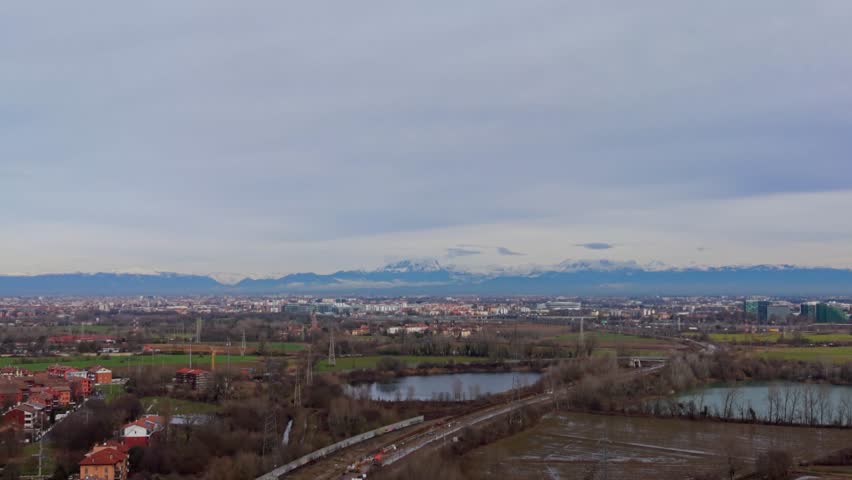 Railway Crossing Near Calm Suburban Lake Milan Aerial View