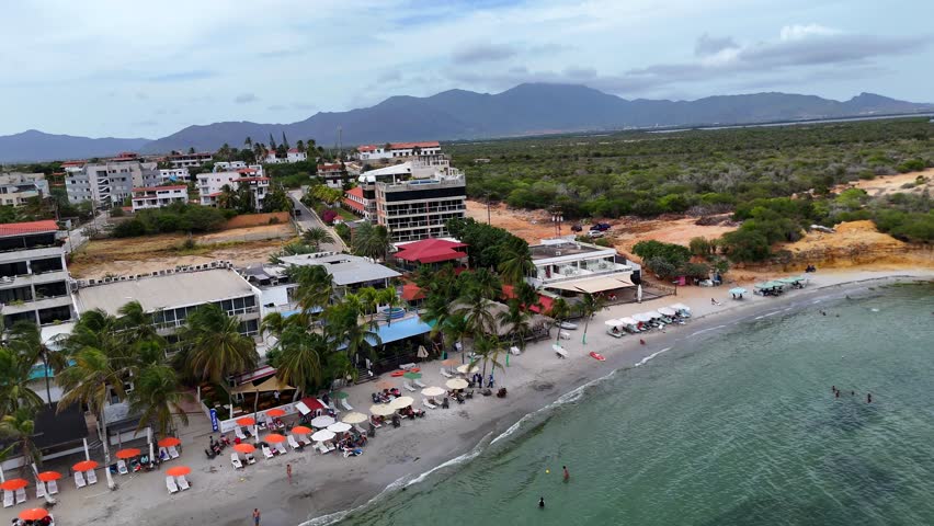 Aerial view of El Yaque beach, hotels and desert, Margarita Island