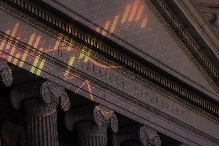 A candlestick charts is red, representing Treasury yields slipping, overlayed on the front facade of the USA Department of the Treasury building in Washington DC.