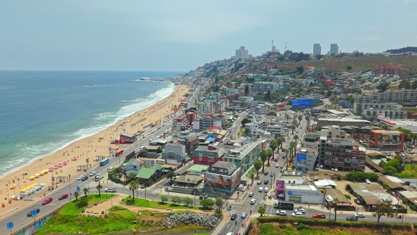 Aerial Cityscape of Renaca Beach, Traffic, Summer Tourists in Vina del Mar Chile