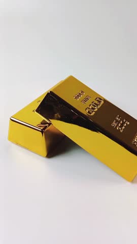 Two gold bars rotating on a white background. Precious metals. Gold reserve gold price gold investment