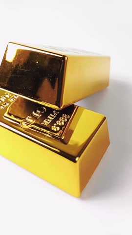 Two gold bars rotating on a white background. Precious metals. Gold reserve gold price gold investment